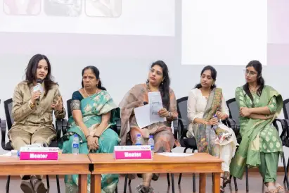 Dr. Priya Kannapan at Yuva OGSSICON 2025 – Quiz Master and Chairperson